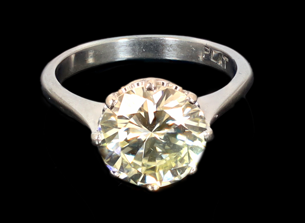 A platinum and solitaire diamond set ring